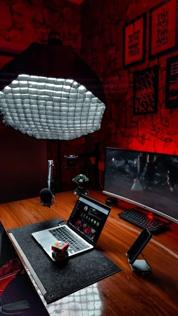 A contemporary workspace showcasing a laptop, tablet, and smartphones, ideal for tech and freelance use.
